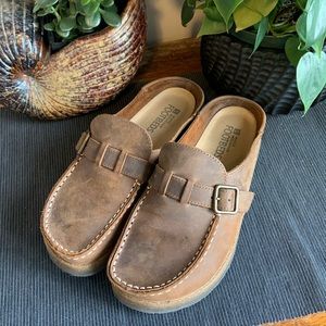 Brown leather clogs, never worn.